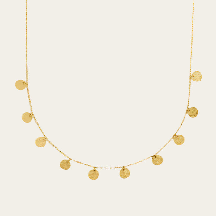 Agape-Alceste-necklace on neutral surface