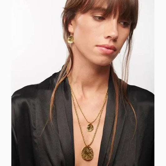aurelie bidermann hermione earrings single drop earrings on model