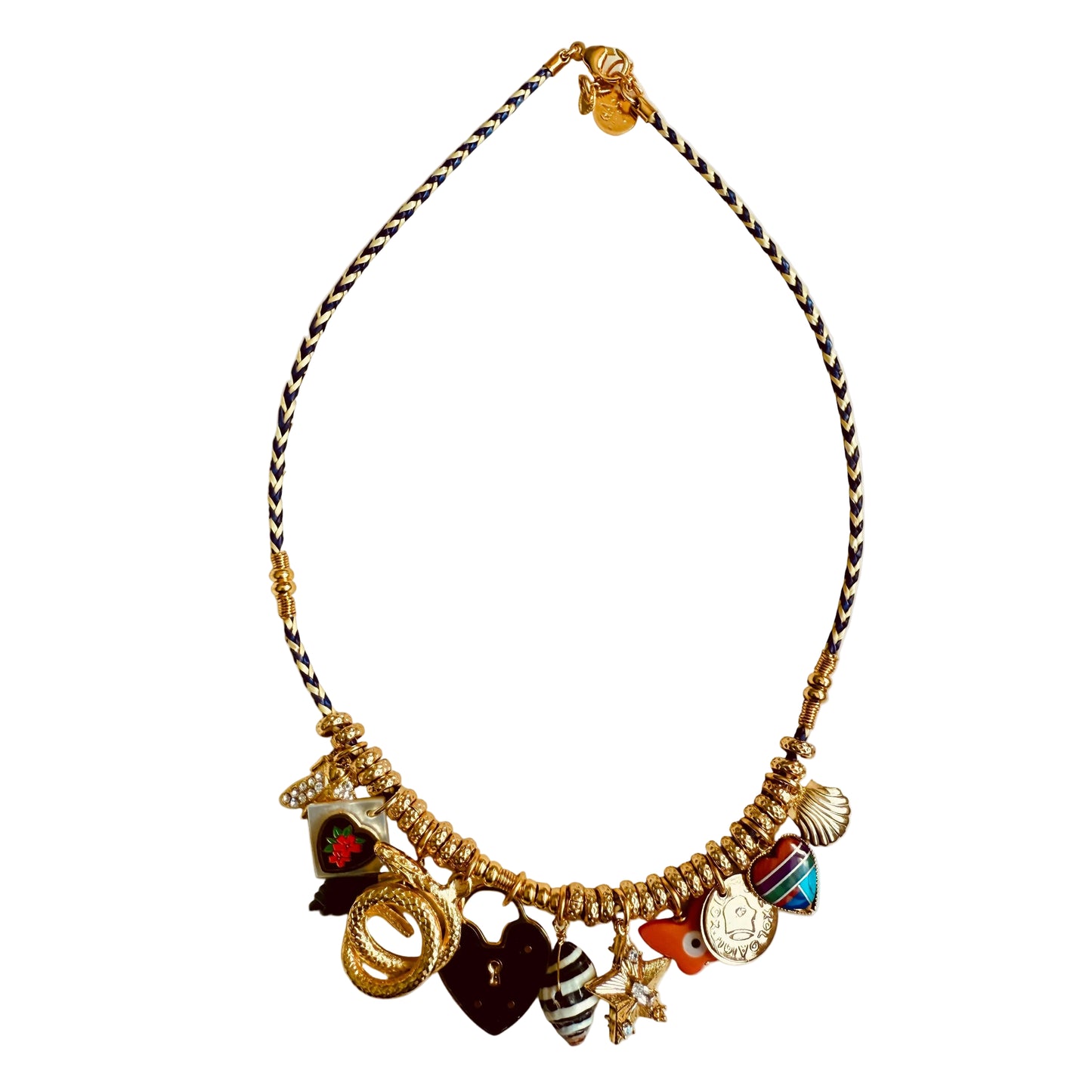 Necklace with various charms on a light background