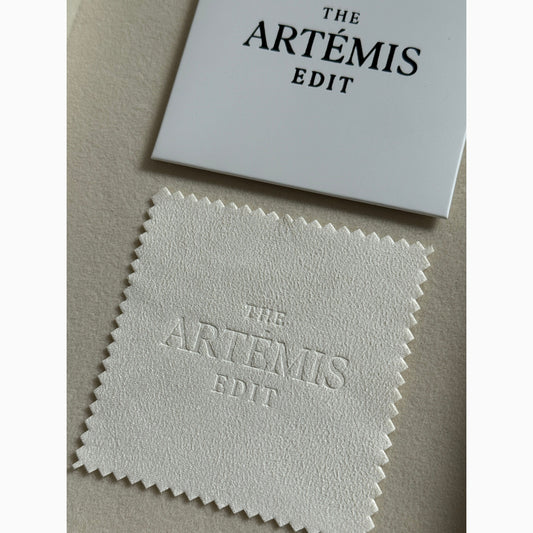 TAE jewellery cloth with white branded sleeve