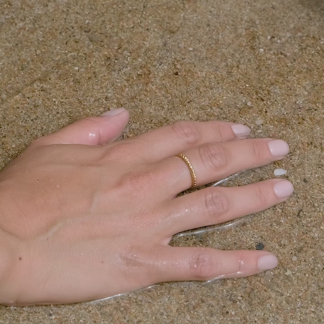 Agapee zetita ring on beach