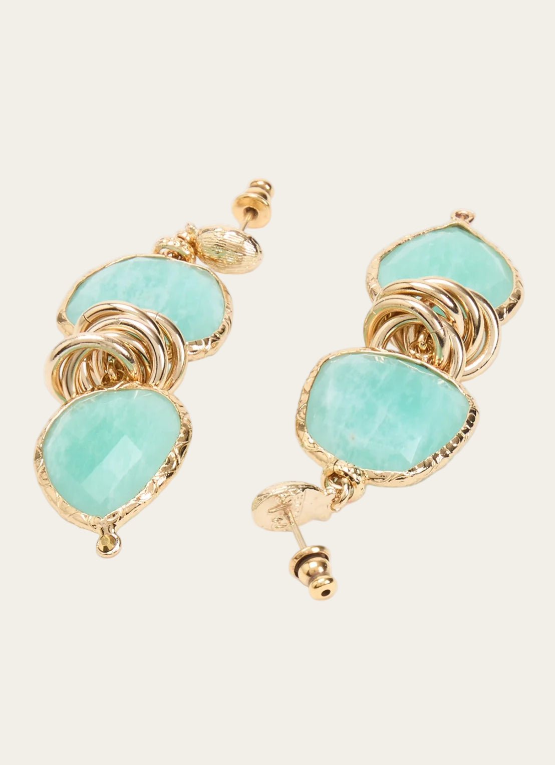 Gas Bijoux earrings with gold and turquoise stones on a white background