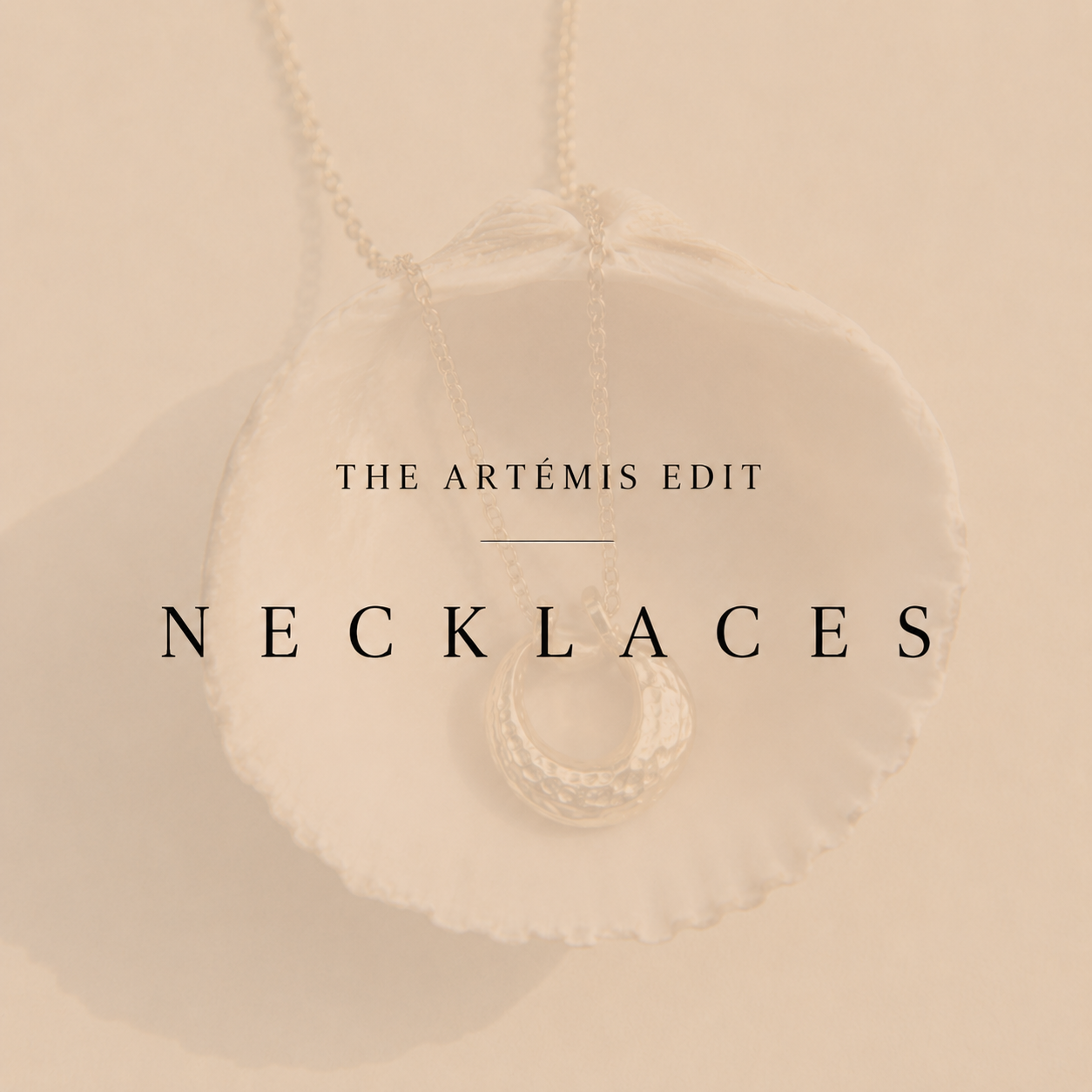 image of a necklace on a shell and necklaces written over the opacity
