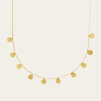 Agape-Alceste-necklace on neutral surface