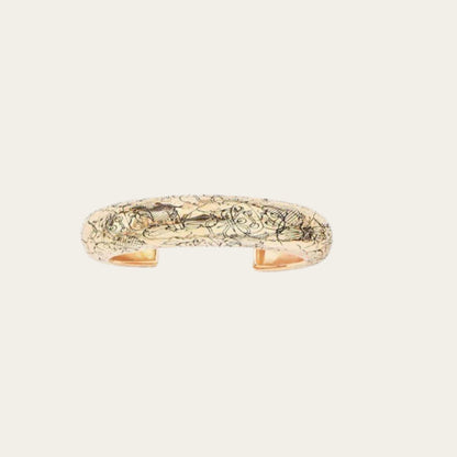 Aurélie Bidermann Rosalba cuff bracelet, crafted in 18k gold brass.&nbsp; The bracelet is decorated with flowers in brass, gilded with 750/1000 yellow gold.