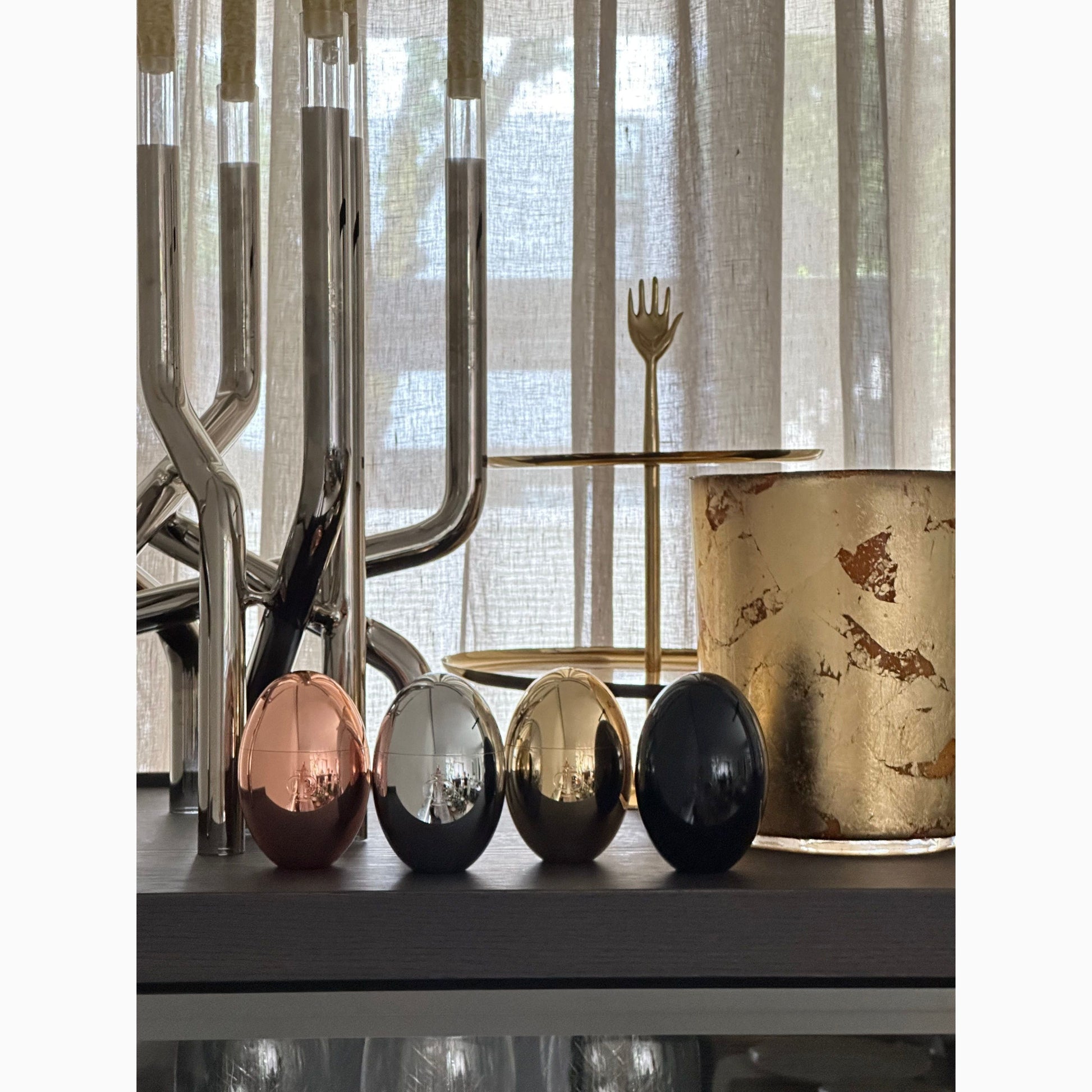 oomorfi egg metallic candles in black silver rose gold and gold