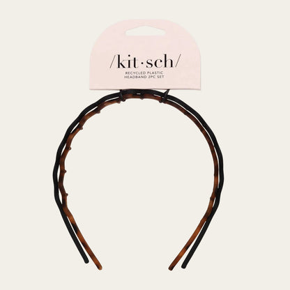 Tortoiseshell headband with 'kit-sch' packaging on a light gray background