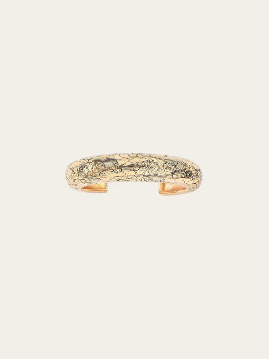 Gold bracelet on a white background