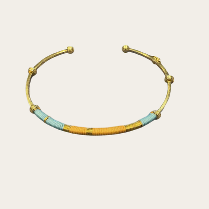 zanzibar bracelet blue orange gas bijoux on neutral backdrop