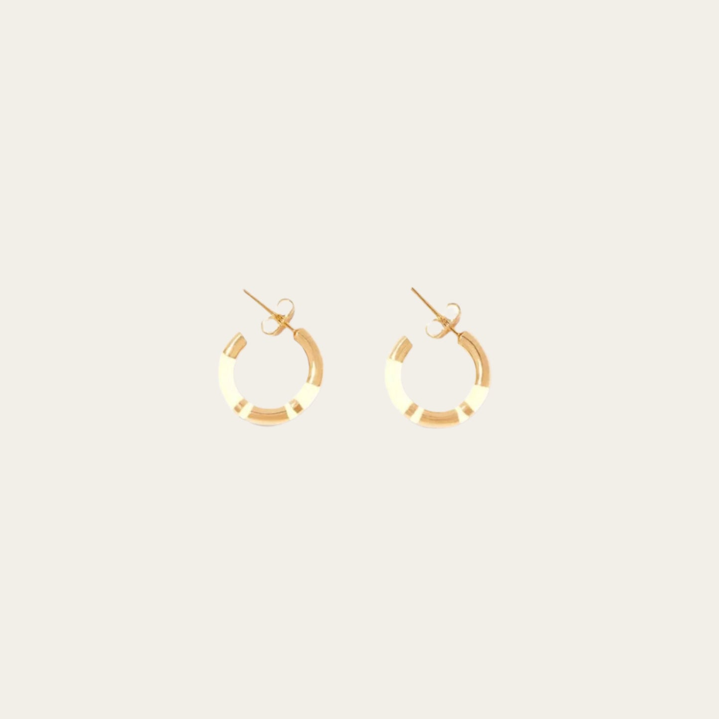 Aurélie Bidermann Positano mini hoop earrings, adorned with chic ivory stripes in resin and gilded with 750/1000 yellow gold.  