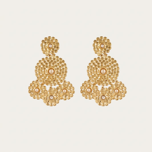 Pair of Gas Bijoux Lucky Sequin Cabochon gold-tone drop earrings with textured circular motifs on a cream background