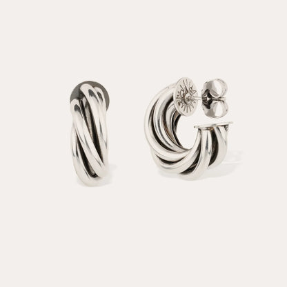 Silver hoop earrings on a white background