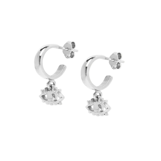 Silver hoop earrings with small round pendants on a white background