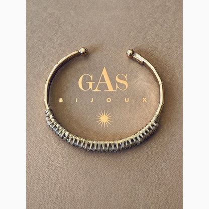 Bracelet on a 'GAS Bijoux' branded box with a beige background