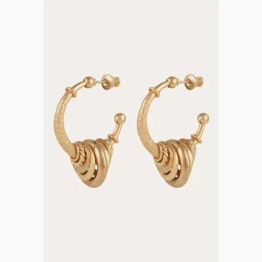 Gas Bijoux Maranzana earrings, gold plated hoops, on neutral backdrop available at The Artemis Edit