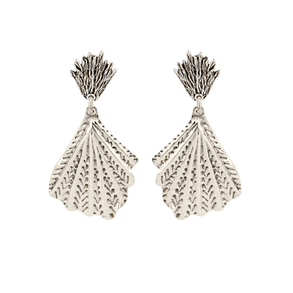 Pair of silver leaf-shaped earrings on a white background