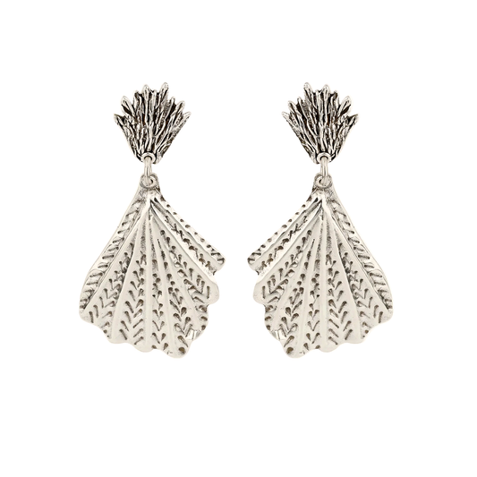 Pair of silver leaf-shaped earrings on a white background