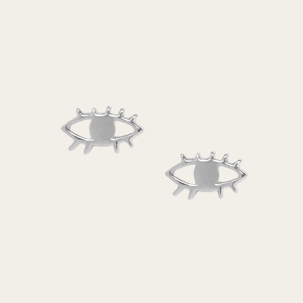 Silver eye-shaped earrings on a white background