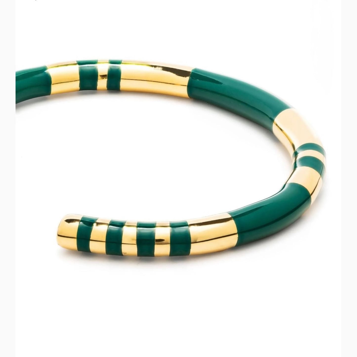 Green and gold bangle on a white background