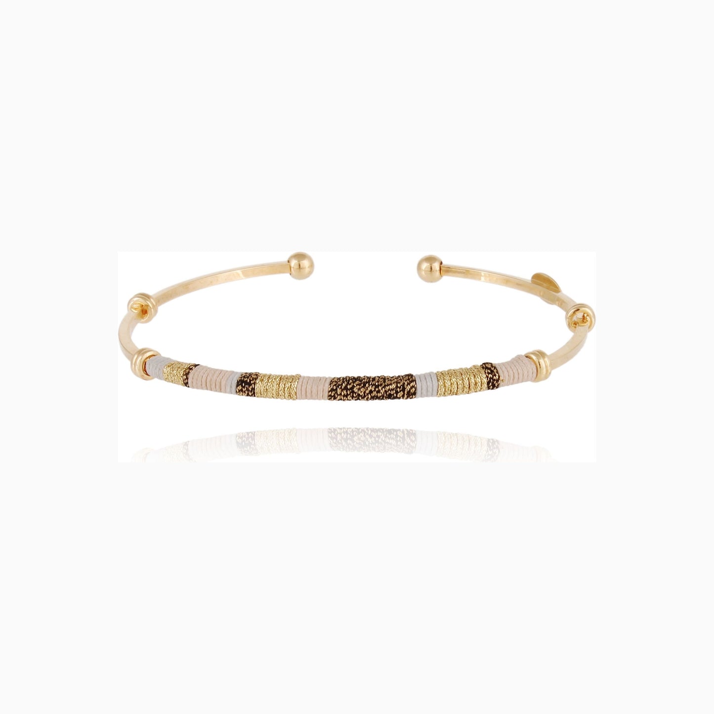 zanzibar gold plated bangle on white background available at The Artemis Edit