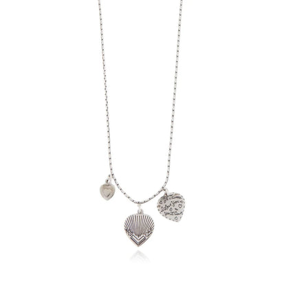 Silver necklace with heart-shaped pendant on a white background