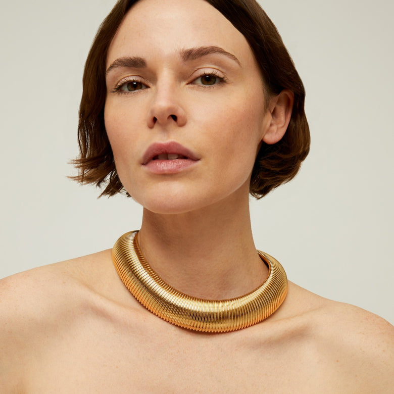 Vintage gold necklace on model