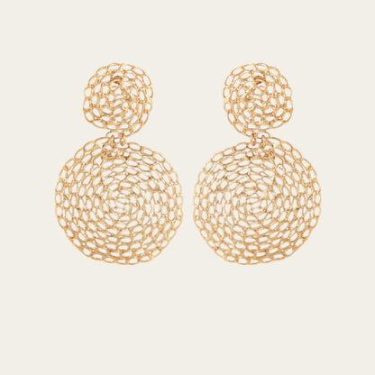 Gold plated round chain earrings on neutral background