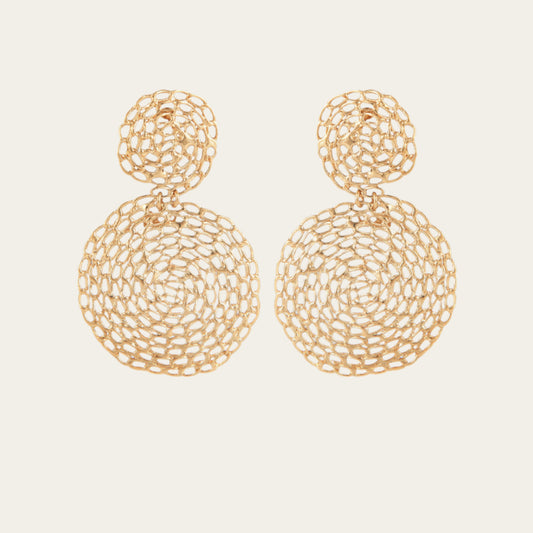 Gold plated round chain earrings on neutral background